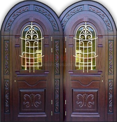 Индивидуальная арочная дверь со стеклом и ковкой ДА-19 в Волоколамске