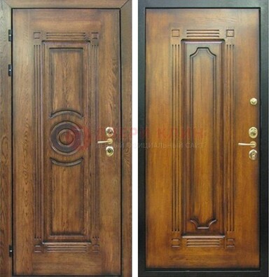 Коричневая металлическая дверь с массивом дуба с рисунком ДМД-10 в Волоколамске