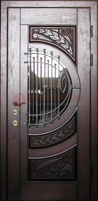 Одностворчатая входная дверь со стеклом и ковкой ДСК-21 в Волоколамске