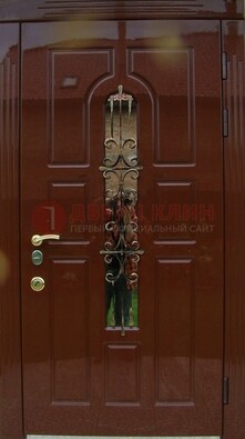 Красивая металлическая дверь со стеклом и ковкой ДСК-33 в Волоколамске